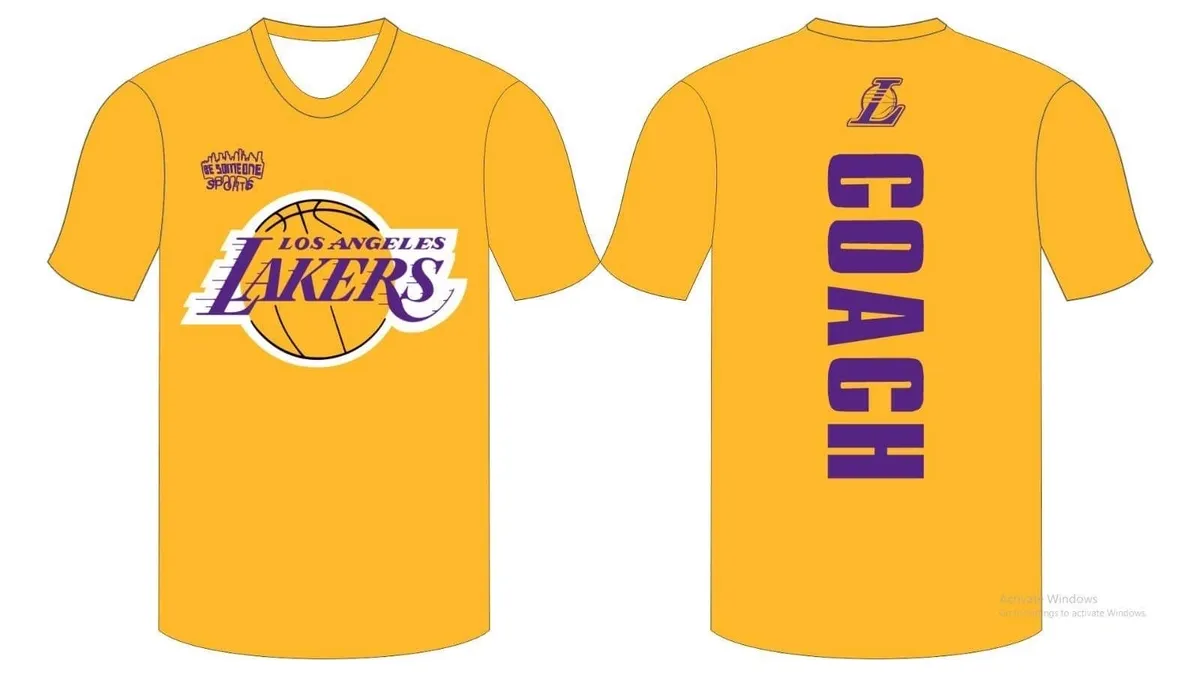 A lakers shirt with the name coach on it.