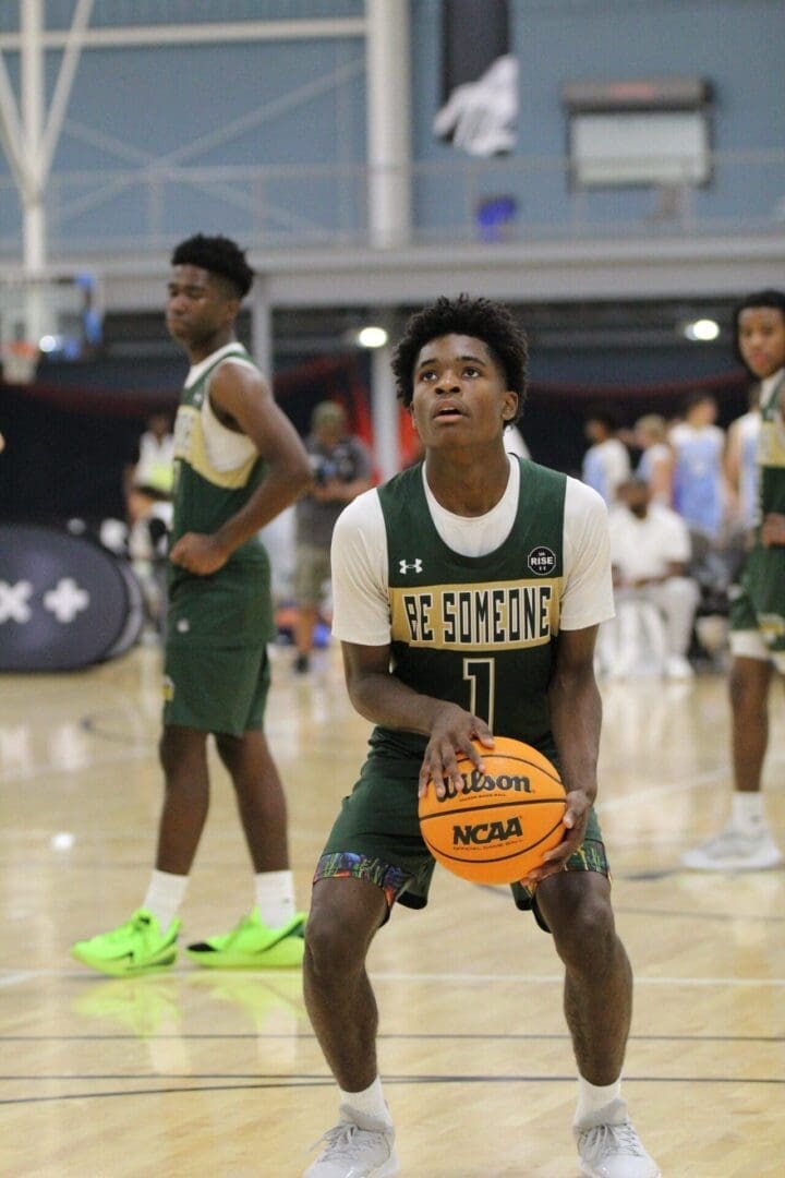 Basketball player preparing to shoot free throw.
