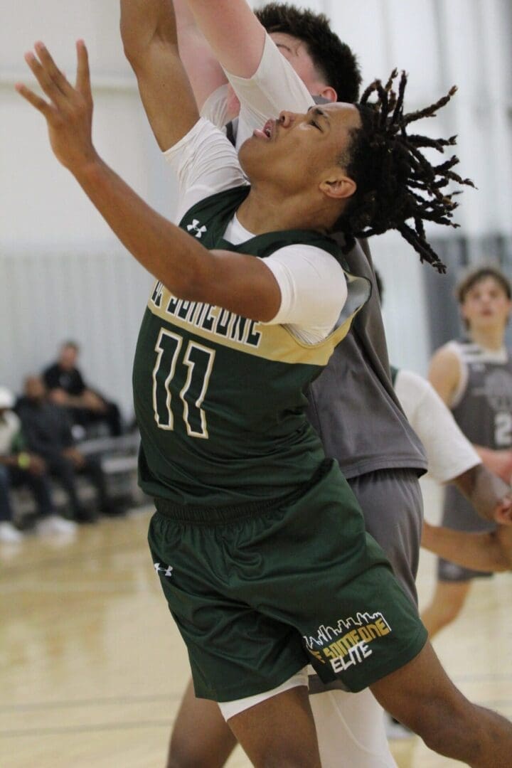Basketball players in action on the court.