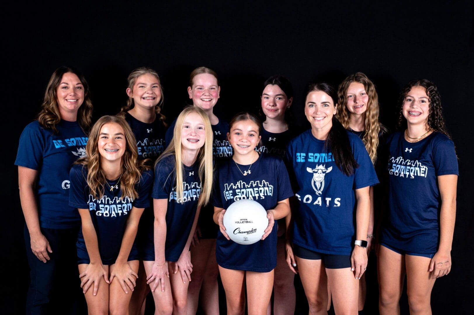 GOATS Club Volleyball Friendswood team posing with volleyball