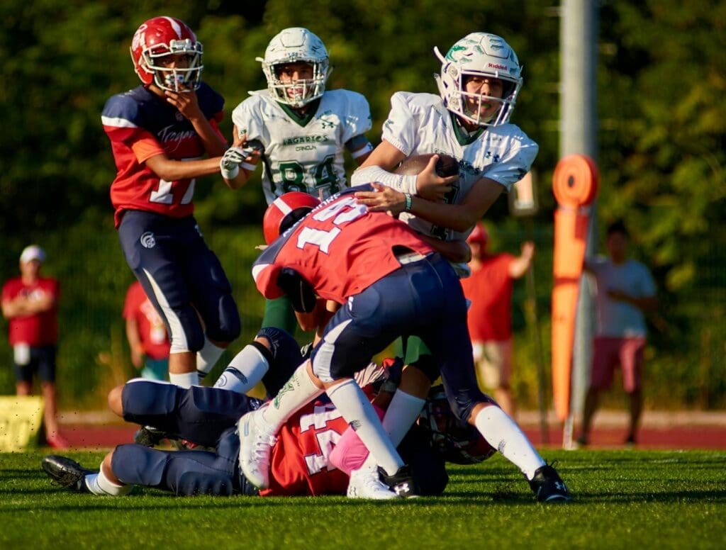 Young athletes competing in a football game