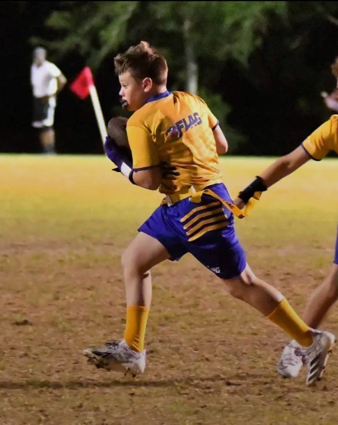 Flag football catch in mid-air