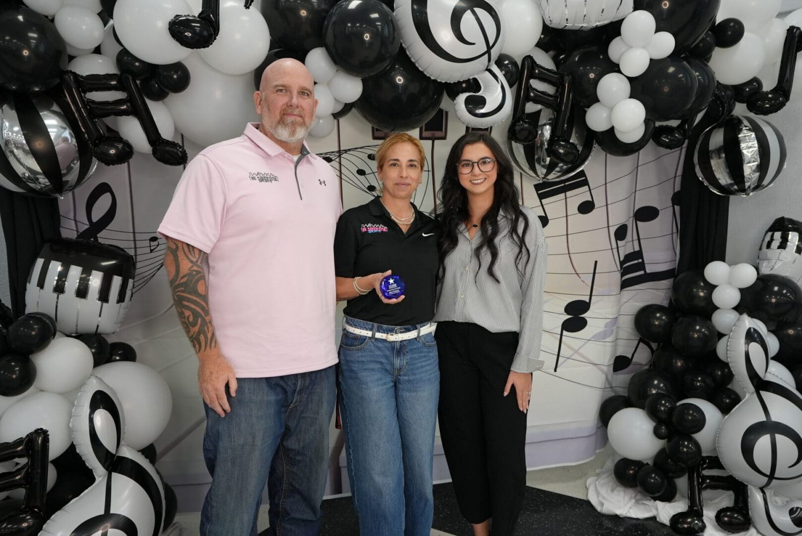 Steven and Bianca receiving the 2026 Community Gem Award from Bay Area Alliance and CCISD Cares