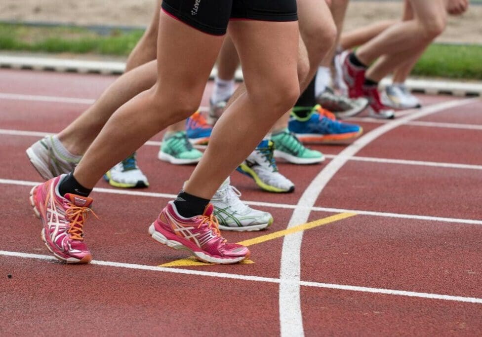 Young athlete sprinting on a track