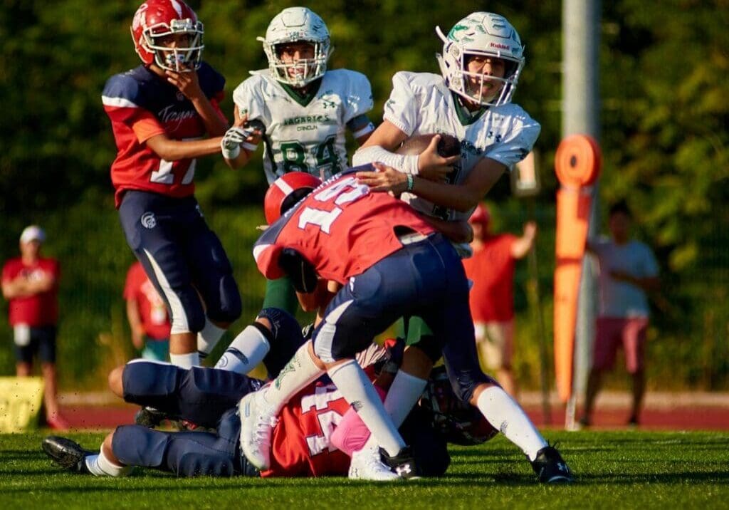 Young athletes competing in a football game